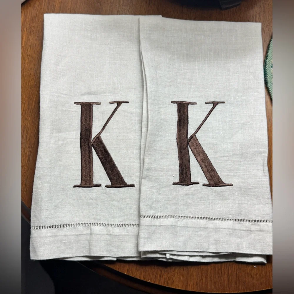 Two EUC “K” monogram brown & beige embroidered finger towelettes by Mudpie